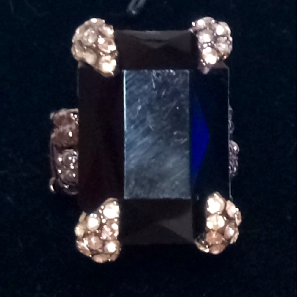 Black Diamonds ring with a silver stretchy back fit all sizes of finger